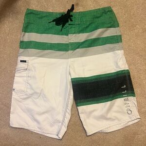 O’Neill green and white striped board shorts, size 30